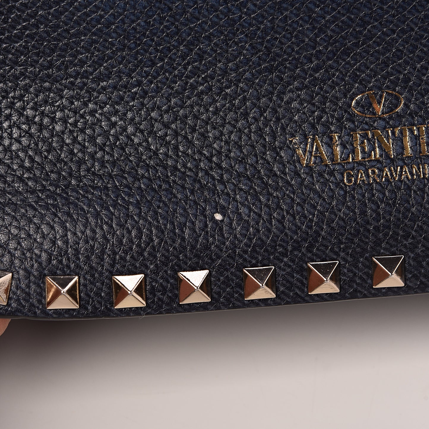 Pebbled Calfskin Medium Rockstud Flap Saddle Bag Deep Denim