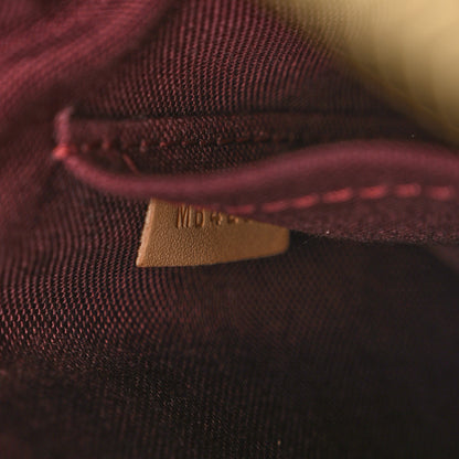 Louis Vuitton Monogram Rivoli MM 7 of 10