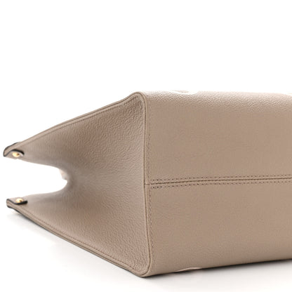 Louis Vuitton Empreinte Monogram Giant Onthego MM Tourterelle Creme 7 of 8