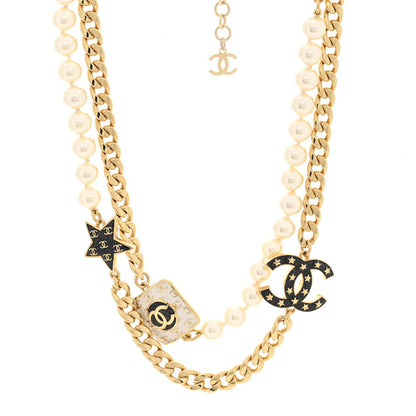 Chanel Metal Enamel Pearl Star CC Necklace Gold White 1 of 4