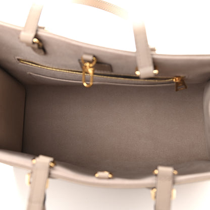 Louis Vuitton Empreinte Monogram Giant Onthego MM Tourterelle Creme 5 of 9