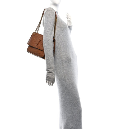 Saint Laurent Crinkled Calfskin Matelasse Monogram Medium Niki Chain Satchel Light Caramel 2 of 11