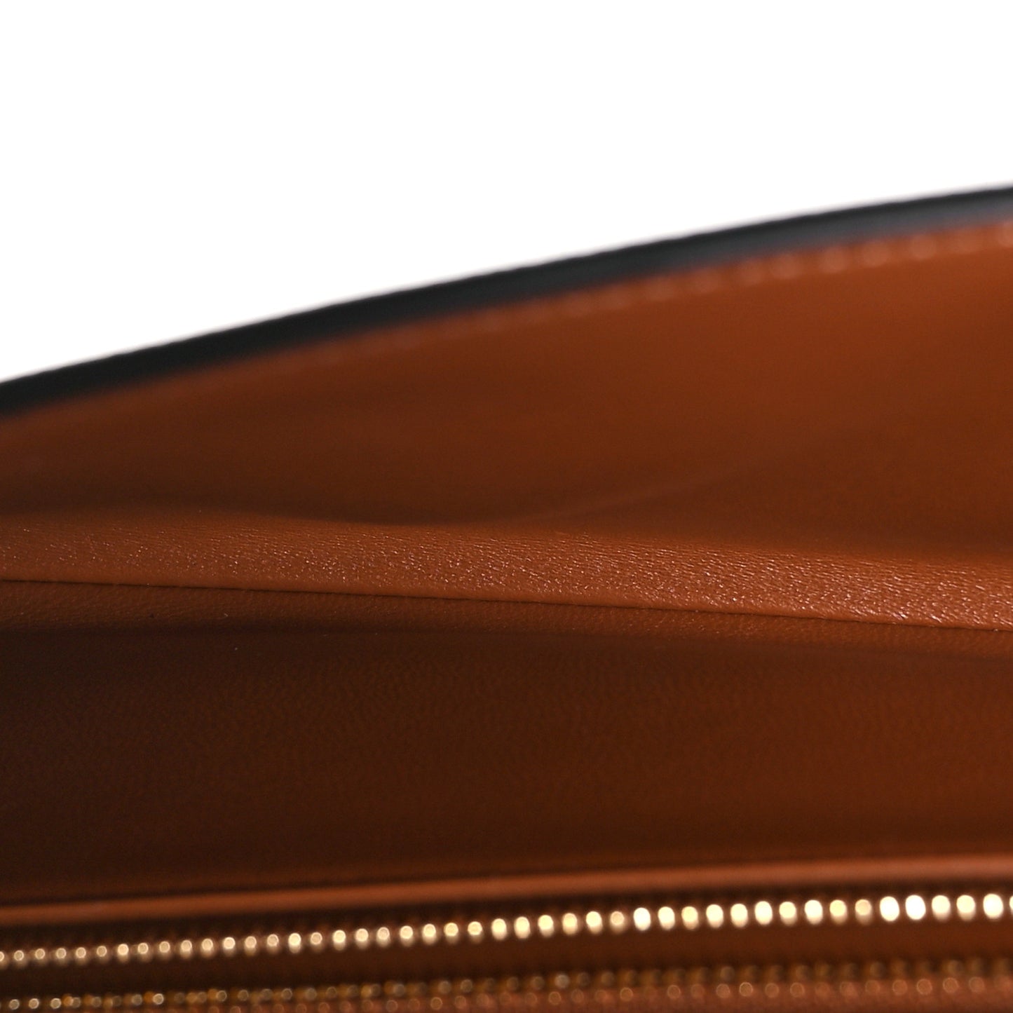 Triomphe Canvas Asymmetric Clutch Tan