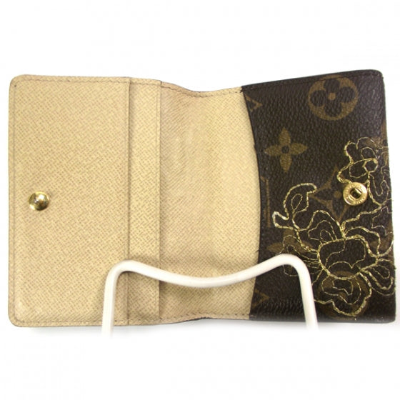 Monogram Dentelle Ludlow Wallet Gold