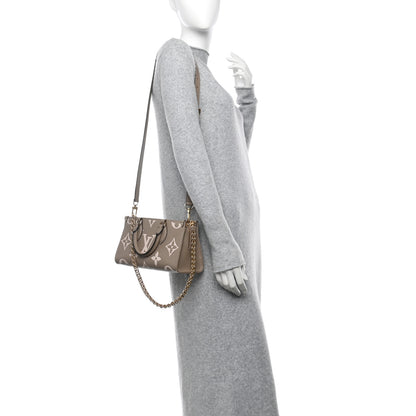 Louis Vuitton Empreinte OnTheGo East West Dove Cream 2 of 9