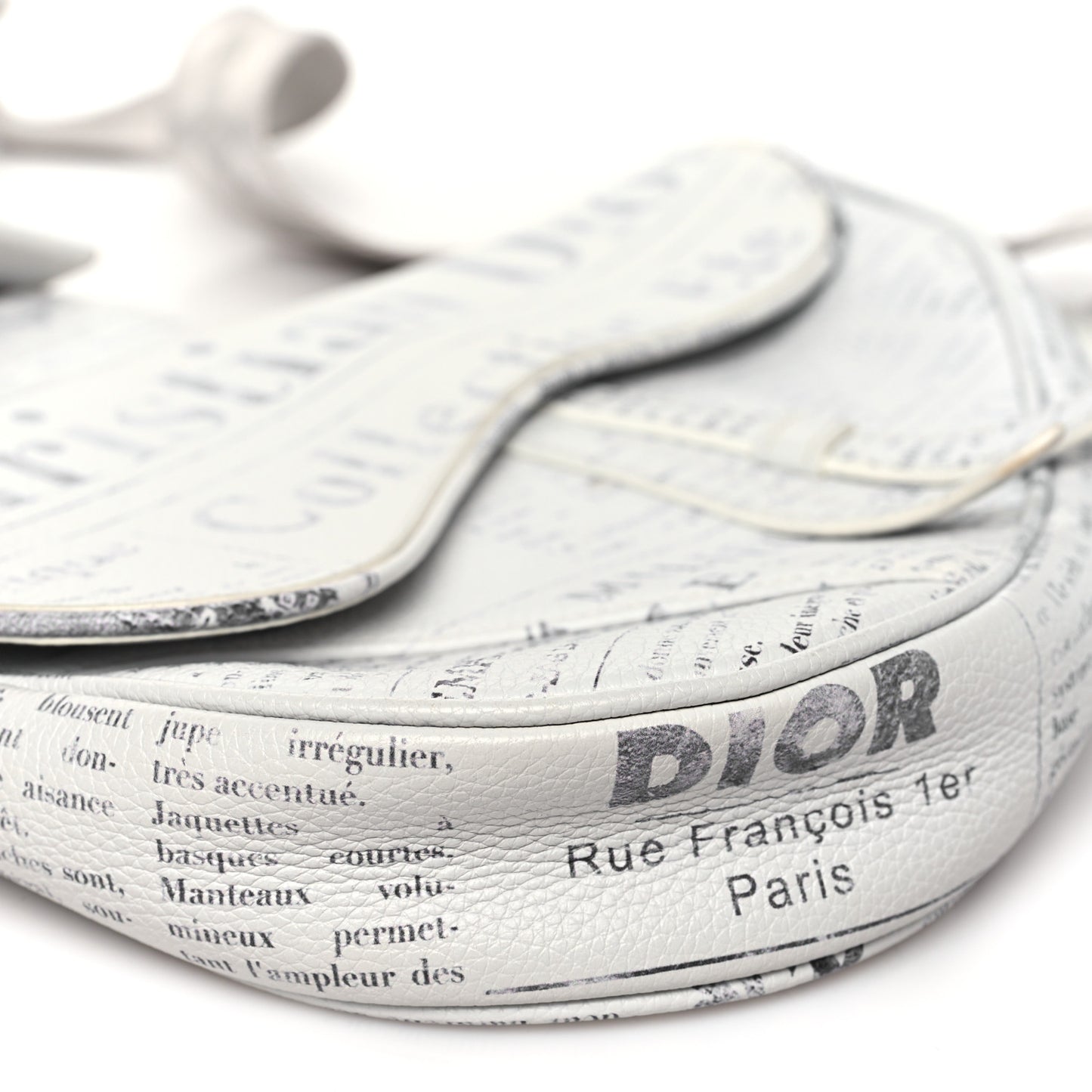 X DANIEL ARSHAM Grained Calfskin Newspaper Print Saddle Bag White