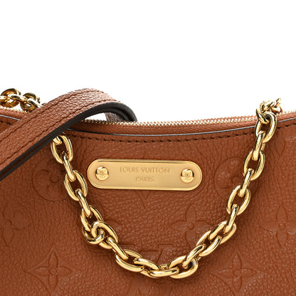 Louis Vuitton Empreinte Monogram Liv Pochette Cognac 7 of 11