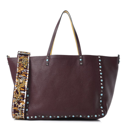 Valentino Garavani Stampa Alce Calfskin Medium Guitar Strap Rockstud Rolling Reversible Tote Wine Yellow 1 of 18