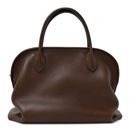 The Row Polished Saddle Calfskin Agnes Bag Deep Brown 1 of 9