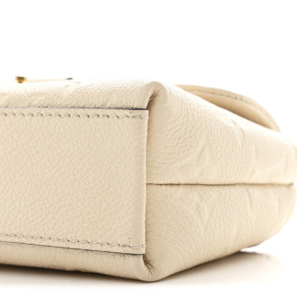 Louis Vuitton Empreinte Monogram Nano Madeleine Creme 9 of 9