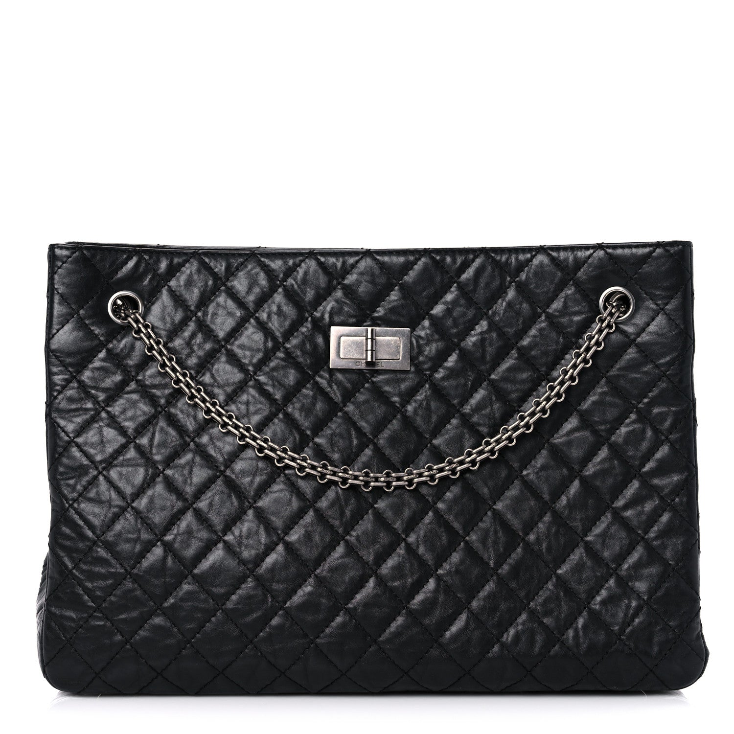 this is an image of a CHANEL Aged Calfskin Reissue 2.55 Tote in the color Black by Fashionphile