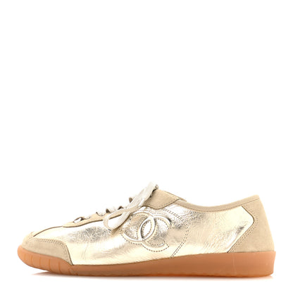 Chanel Laminated Calfskin Suede CC Sneakers 38 Gold 1 of 8