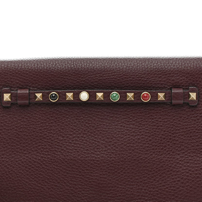 Valentino Garavani Pebbled Calfskin Rockstud Rolling Wristlet Clutch  Rubin 9 of 13