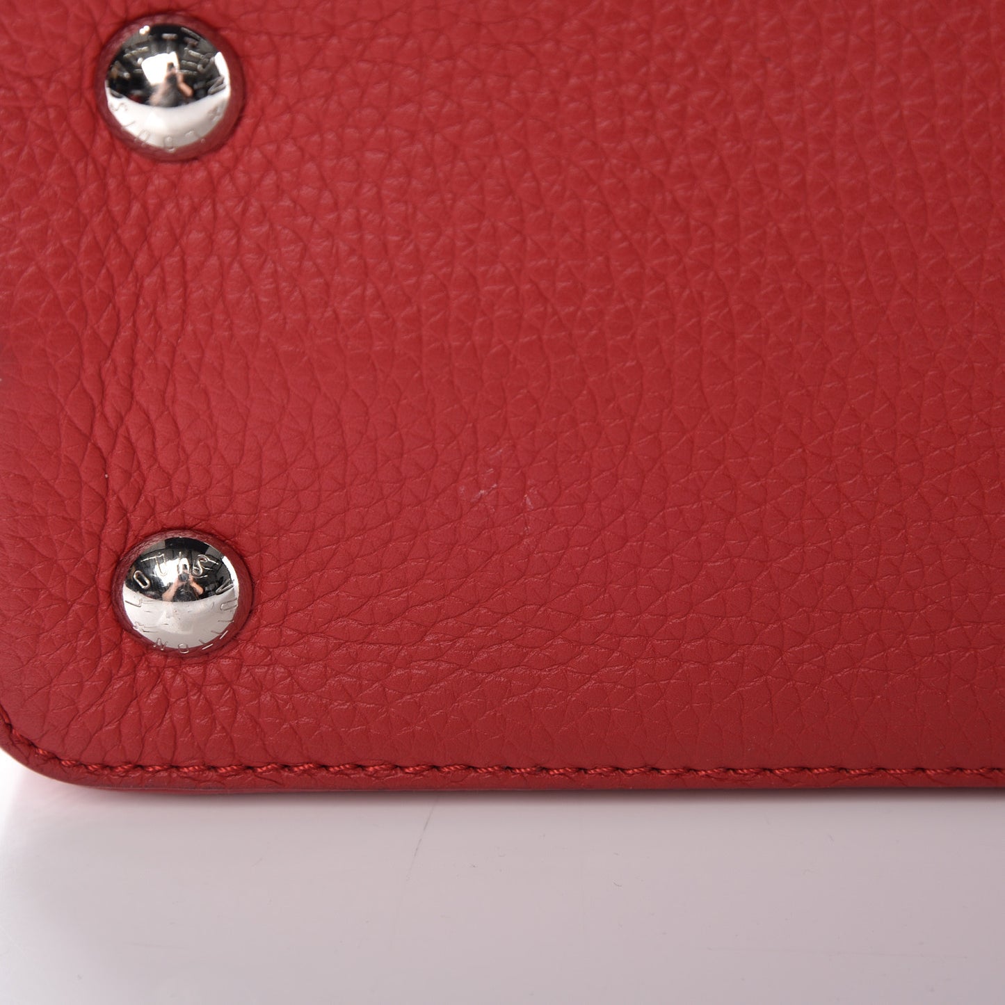 Taurillon Capucines PM Rubis