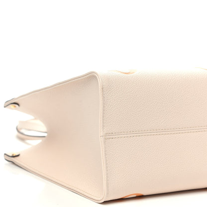 Louis Vuitton Empreinte Monogram Giant By The Pool Onthego MM Cream Saffron 10 of 12