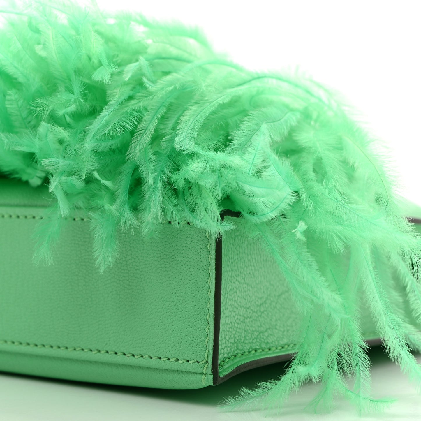 Chevre Ostrich Feather Kelly Elan Vert Comics
