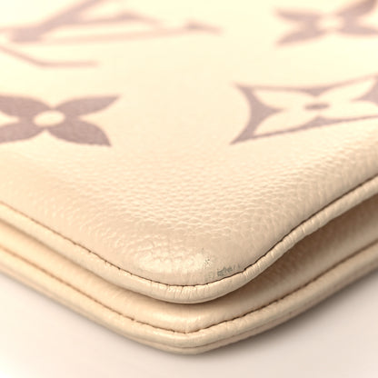 Louis Vuitton Empreinte Monogram Giant Double Zip Pochette Creme Bois De Rose 8 of 8