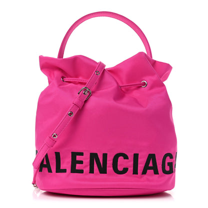 Balenciaga Recycled Sport Nylon Logo Embroidered Small Wheel Drawstring Bucket Bag Fuchsia Black 1 of 4
