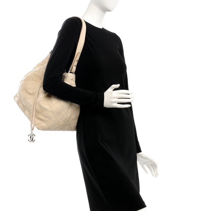 Chanel Glazed Calfskin On The Road Drawstring Tote Ivory 2 of 11