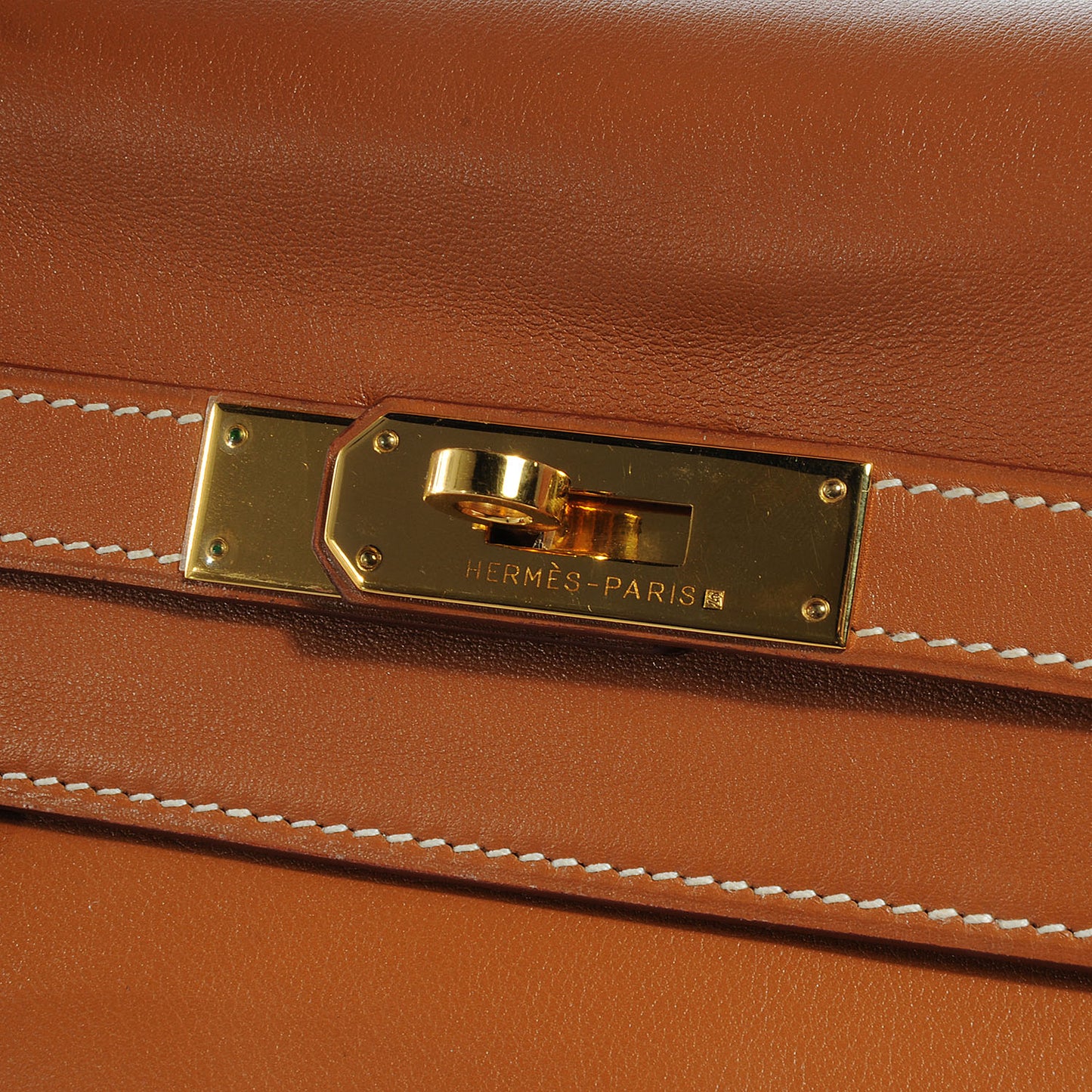 Swift Kelly Retourne 35 Gold