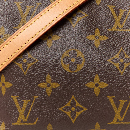 Louis Vuitton Monogram Trotteur 9 of 12