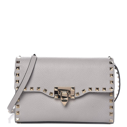 Valentino Garavani Pebbled Calfskin Medium Rockstud Flip Lock Crossbody Bag Pastel Grey 1 of 8