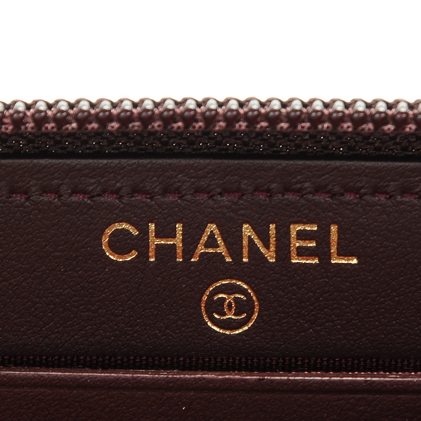 Caviar Quilted Small Boy Zip Around Wallet Dark Purple