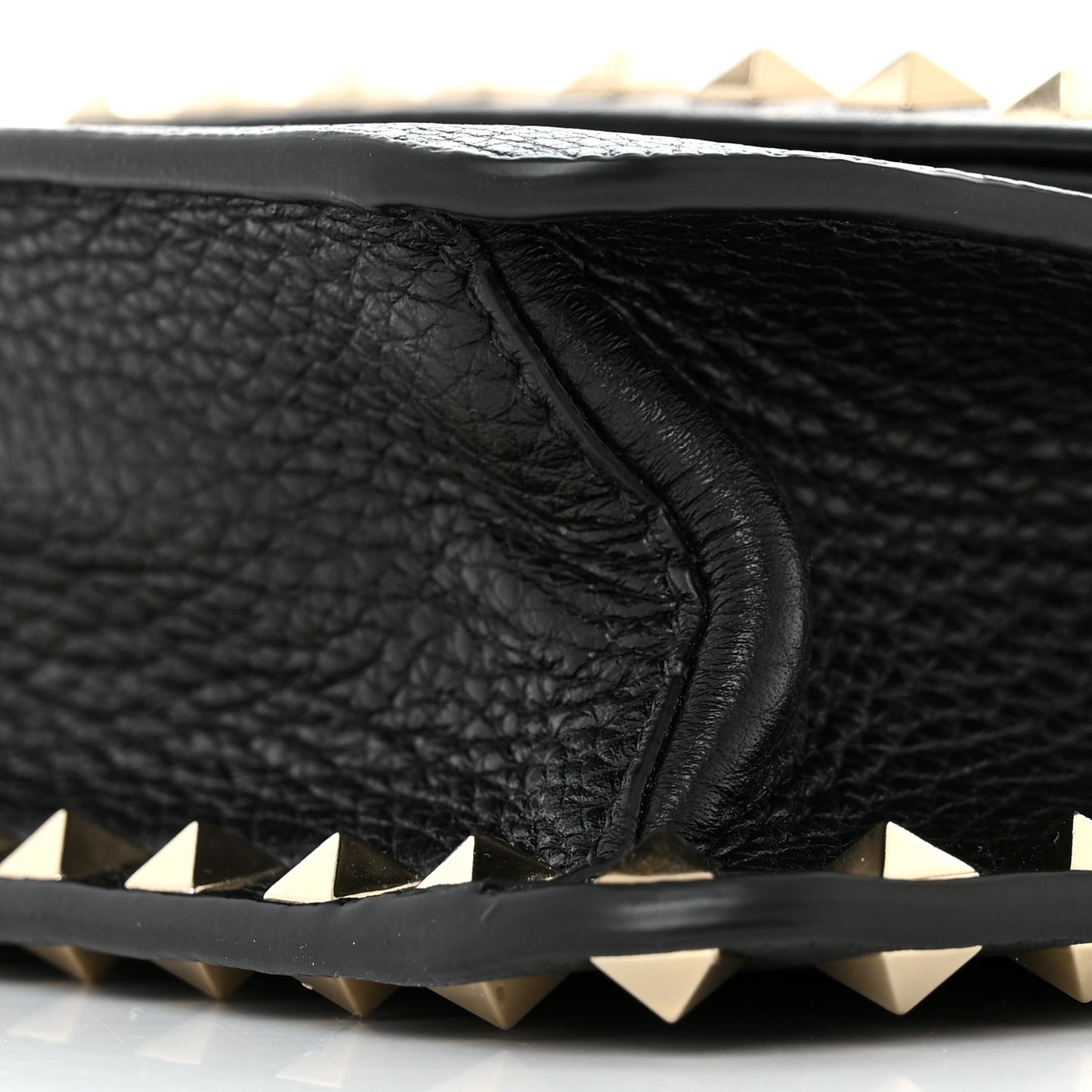 Pebbled Calfskin Rockstud Side Slip Crossbody Black