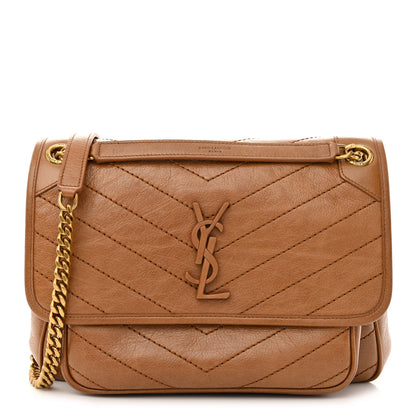 Saint Laurent Crinkled Calfskin Matelasse Monogram Medium Niki Chain Satchel Light Caramel 1 of 10