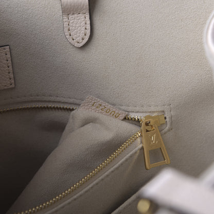 Louis Vuitton Empreinte Monogram Giant By The Pool Onthego MM Cream Saffron 10 of 10