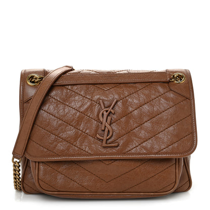 Saint Laurent Crinkled Calfskin Matelasse Monogram Medium Niki Chain Satchel Light Caramel 1 of 11