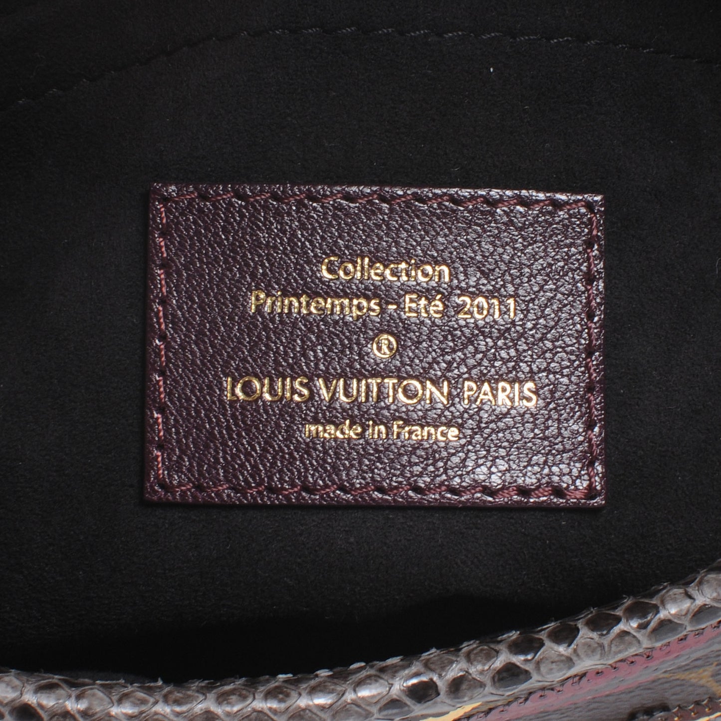 Monogram Savage Tiger Clutch Bordeaux