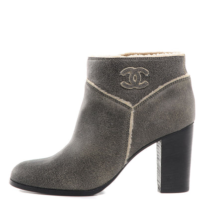 Chanel Distressed Shearling Ankle Boots Shoes 38.5 Black Beige 1 of 7
