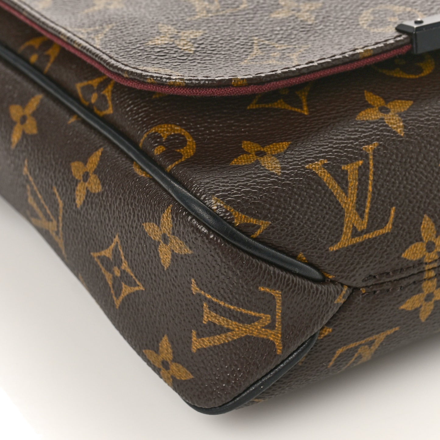 Monogram Macassar District PM