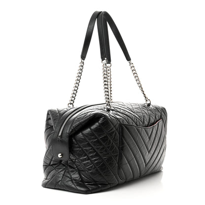 Chanel Aged Calfskin Chevron Quilted Duffle Bag Black 3 of 10