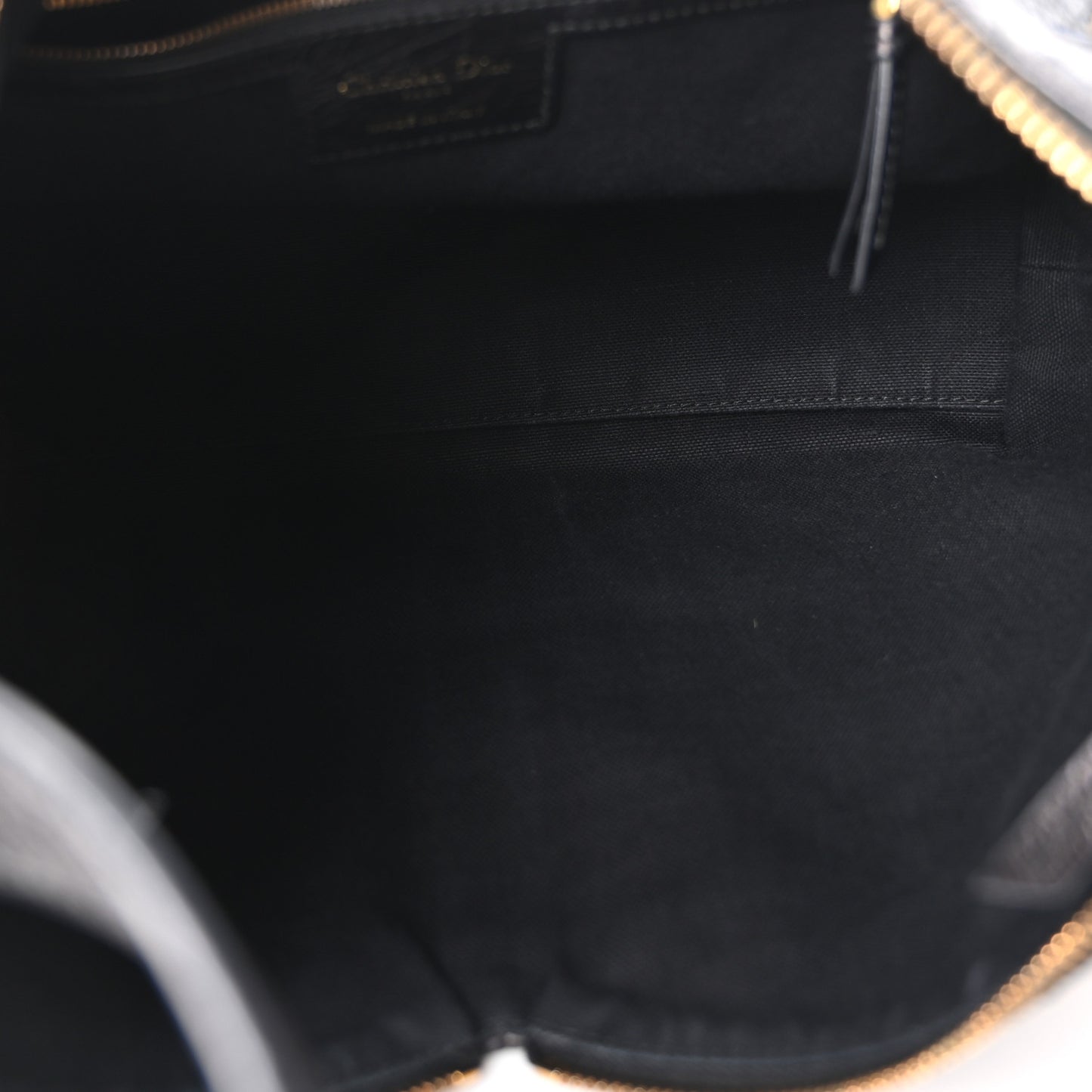 Grained Calfskin Flat Macrocannage Medium Voyage Bag Black