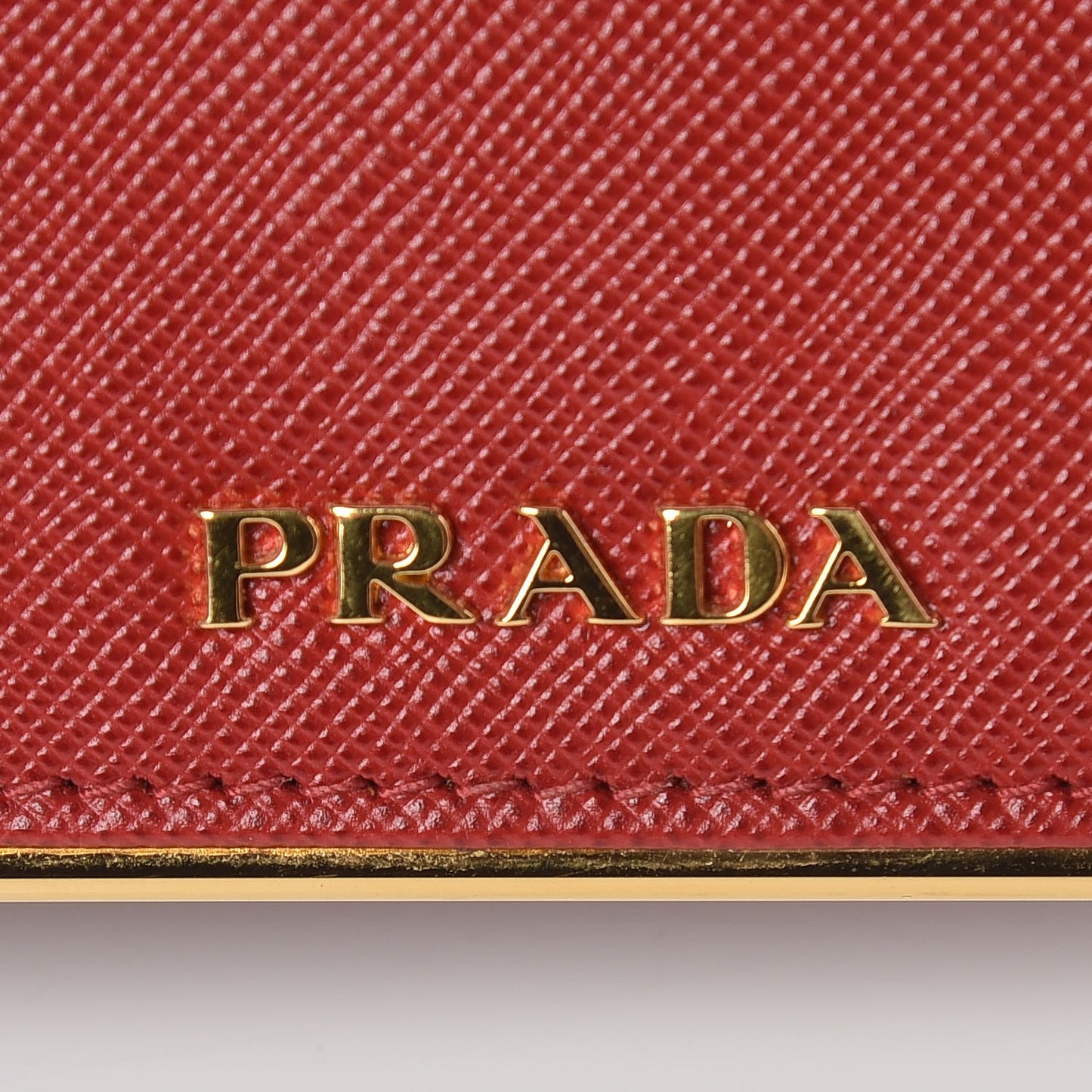 Saffiano Metal Bar Continental Flap Wallet Fuoco