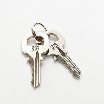 Louis Vuitton Brushed Titanium Lock and Key Set 3 of 4