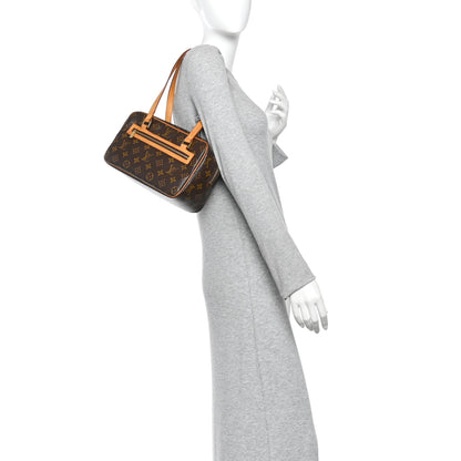 Louis Vuitton Monogram Cite MM 2 of 9