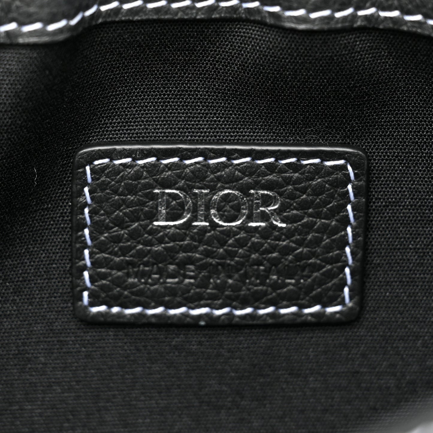 X KAWS Grained Calfskin Saddle Pouch Black