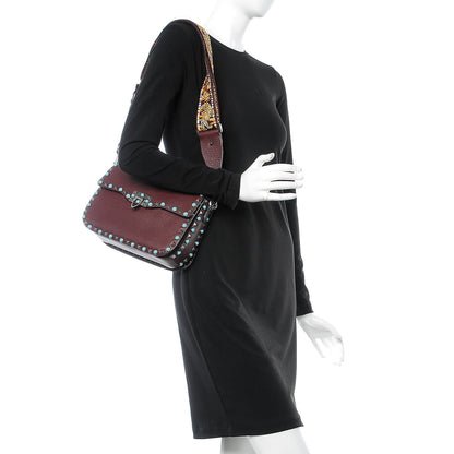 Valentino Garavani Pebbled Calfskin Medium Guitar Strap Rockstud Rolling Flap Saddle Bag Rubin 2 of 8