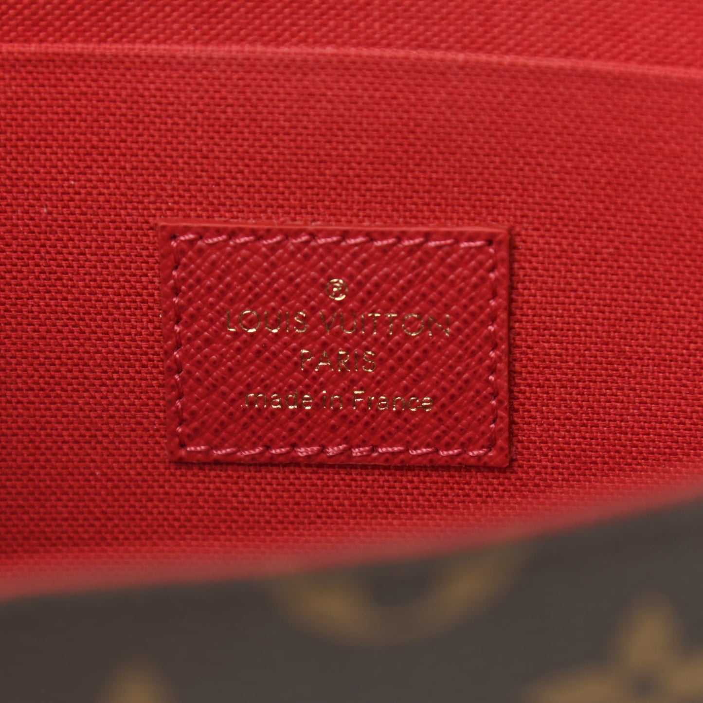 Monogram World Tour Pochette Felicie