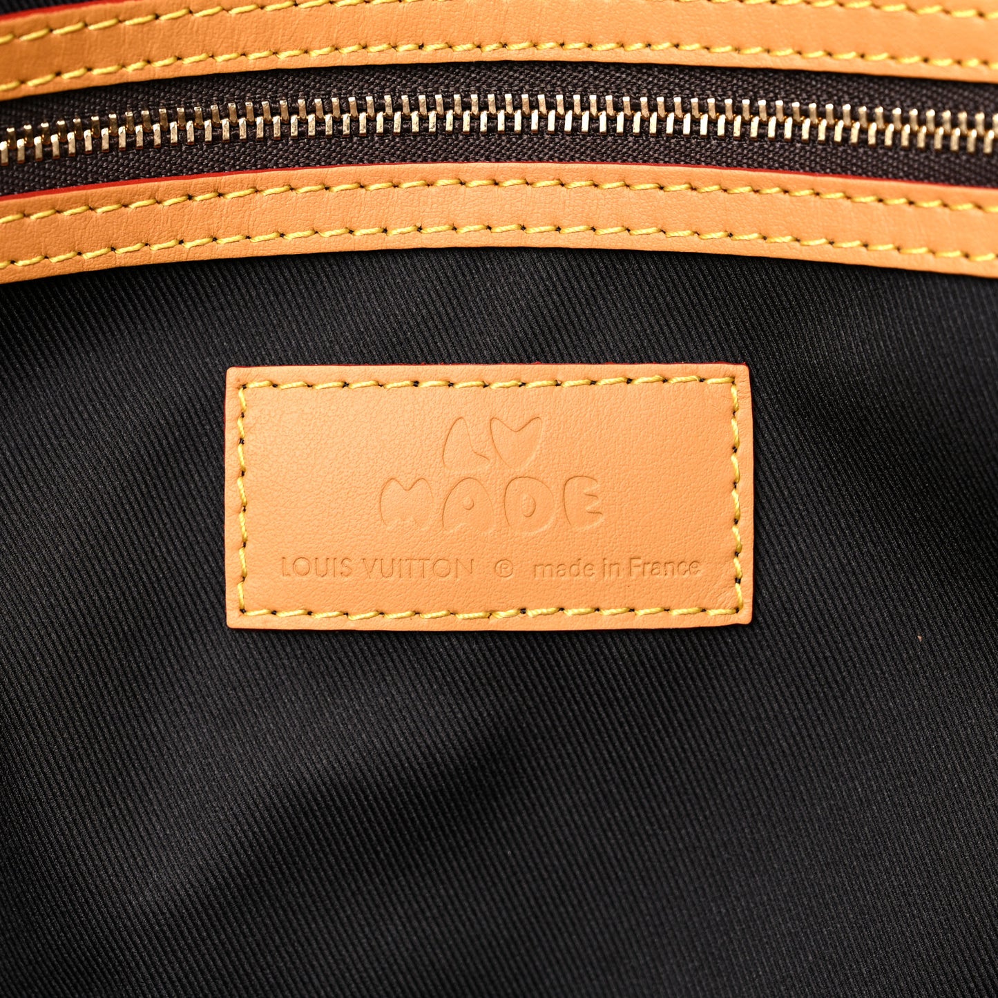 X NIGO Reverse Monogram Stripe Keepall Bandouliere 50 Brown