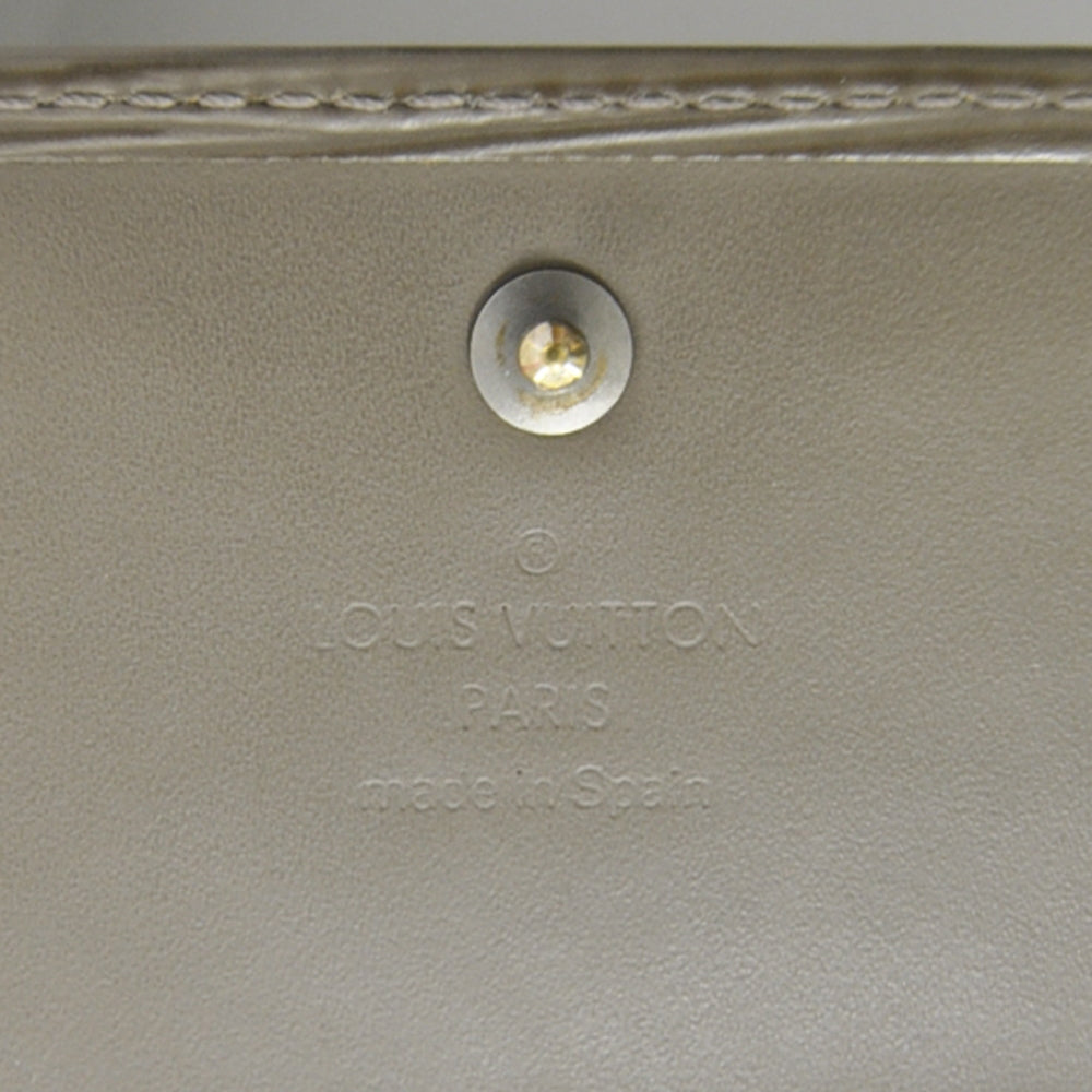 Epi Porte Tresor International Wallet Pepper