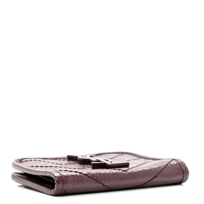 Saint Laurent Crinkled Calfskin Matelasse Monogram Niki Card Holder Rouge Legion 4 of 6