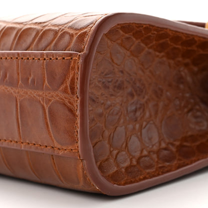 Saint Laurent Shiny Calfskin Crocodile Embossed Small Manhattan Baguette Dark Caramel 10 of 10