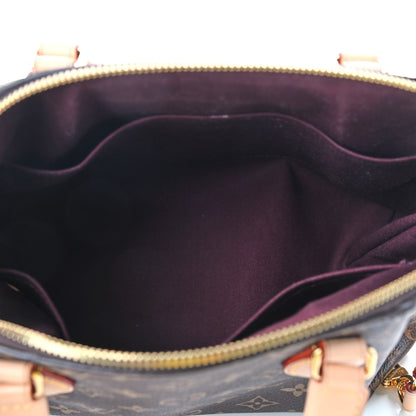 Louis Vuitton Monogram Rivoli PM 5 of 9