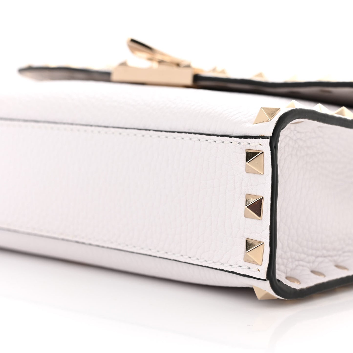 Pebbled Calfskin Medium Rockstud Flip Lock Crossbody Bag White
