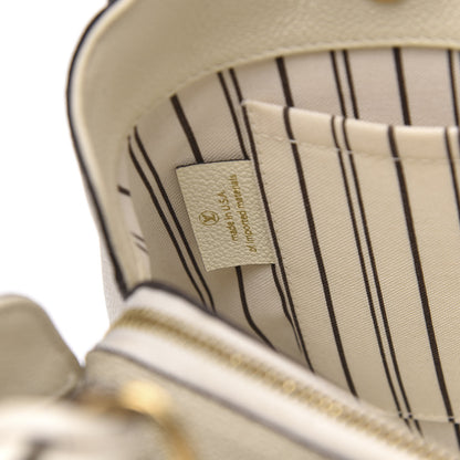 Louis Vuitton Empreinte Montaigne MM Neige 7 of 13