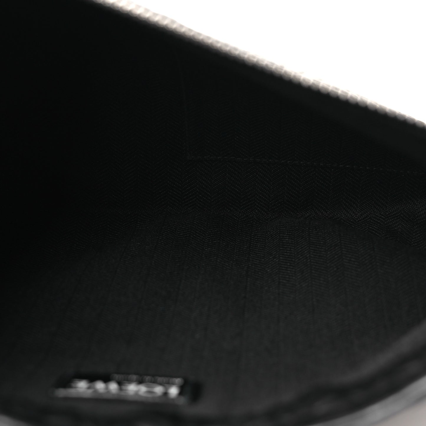 Calfskin Embossed Repeat T Pouch Black
